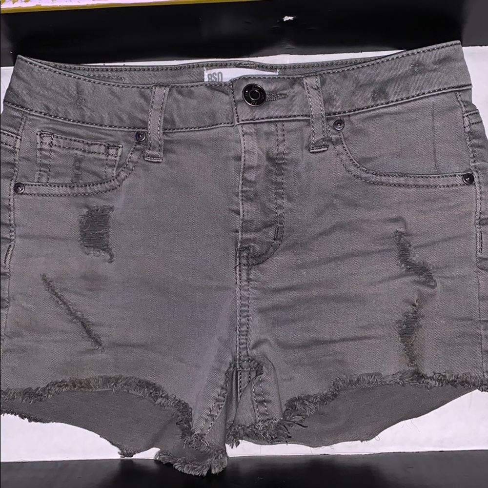 Olive green mid rise distressed shorts worn twice